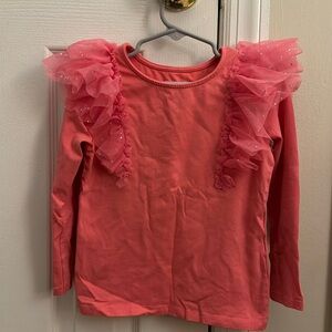 Pink tulle shoulder glitter detail.